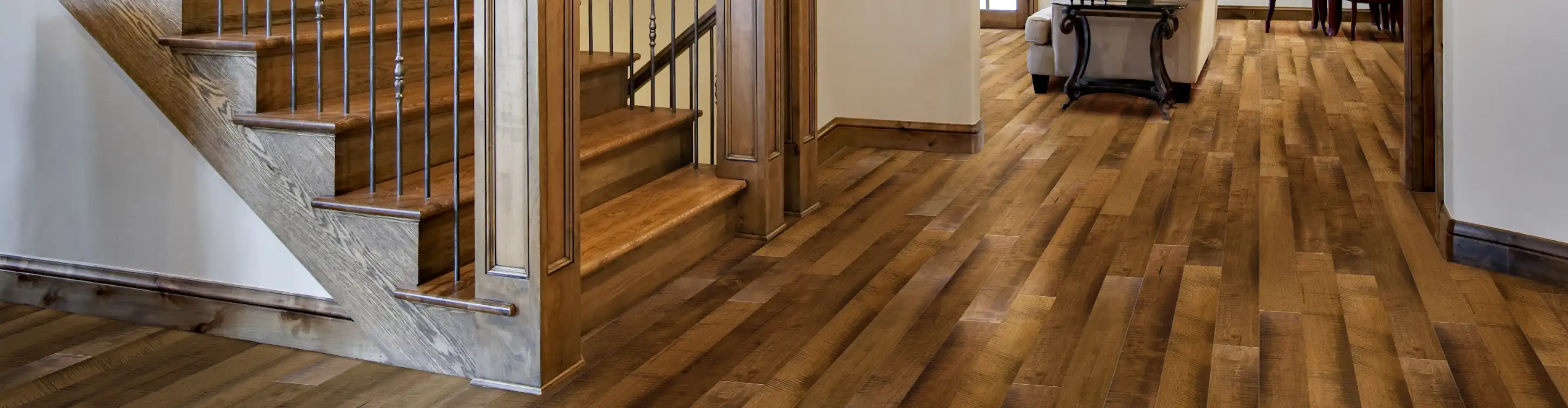 Hardwood floor in entryway with staircase, dark wood 